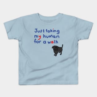 Dog is taking his human for a walk Kids T-Shirt